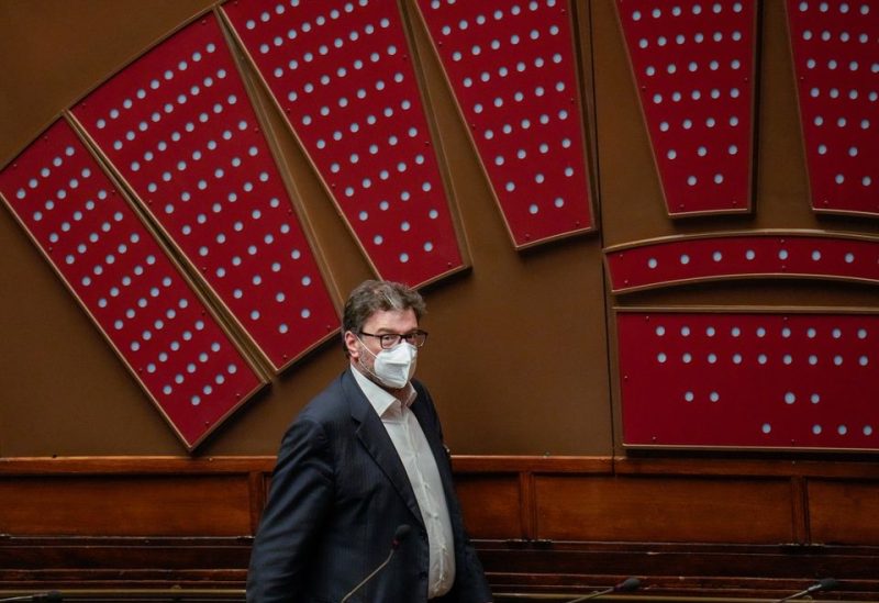 Italy's Minister of Economic Development Giancarlo Giorgetti walks at the end of the eighth round of voting for Italy's new President, at the Italian parliament in Rome, Italy January 29, 2022. Gregorio Borgia/Pool via REUTERS