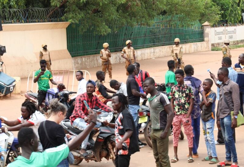 Soldiers block the road to stop the advance of protesters against junta leader Paul-Henri Damiba, on a street in Ouagadougou, Burkina Faso September 30, 2022. REUTERS
