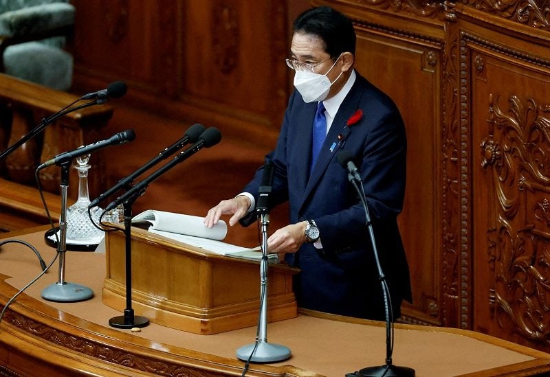 FILE PHOTO: Japan's Prime Minister Fumio Kishida delivers a policy speech during an extraordinary session at the lower house of parliament in Tokyo, Japan October 3, 2022. REUTERS/Issei Kato/File Photo//File Photo