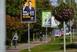 Election campaign poster depicting parliament member candidates from different political parties are seen in Jelgava, Latvia September 28, 2022. REUTERS
