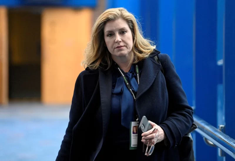 Britain's Leader of the House of Commons Penny Mordaunt walks during the annual Conservative Party conference in Birmingham, Britain, October 2, 2022. REUTERS/Toby Melville/File Photo