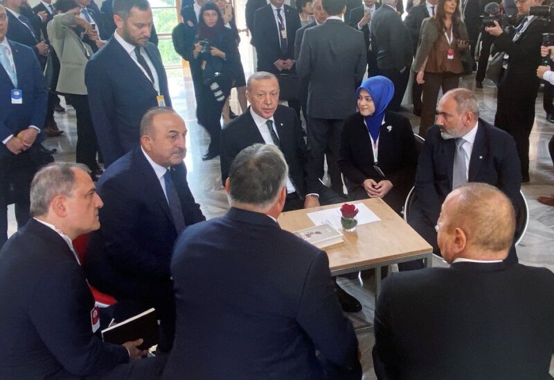 Turkish President Tayyip Erdogan, accompanied by Foreign Minister Mevlut Cavusoglu, chats with Azerbaijan's President Ilham Aliyev and Armenia's Prime Minister Nikol Pashinyan at the Informal EU 27 Summit and Meeting within the European Political Community in Prague, Czech Republic October 6, 2022