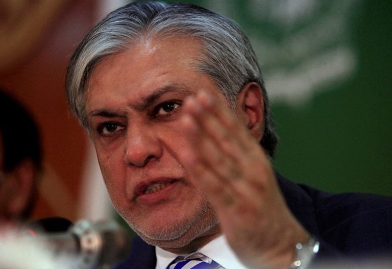 FILE PHOTO: Pakistan's Finance Minister Ishaq Dar gestures during a news conference to announce the economic survey of fiscal year 2016-2017, in Islamabad, Pakistan, May 25, 2017. REUTERS/Faisal Mahmood/File Photo