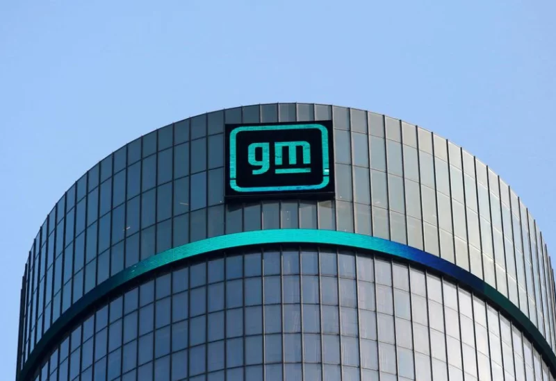 The new GM logo is seen on the facade of the General Motors headquarters in Detroit, Michigan, U.S., March 16, 2021. REUTERS/Rebecca Cook/File Photo