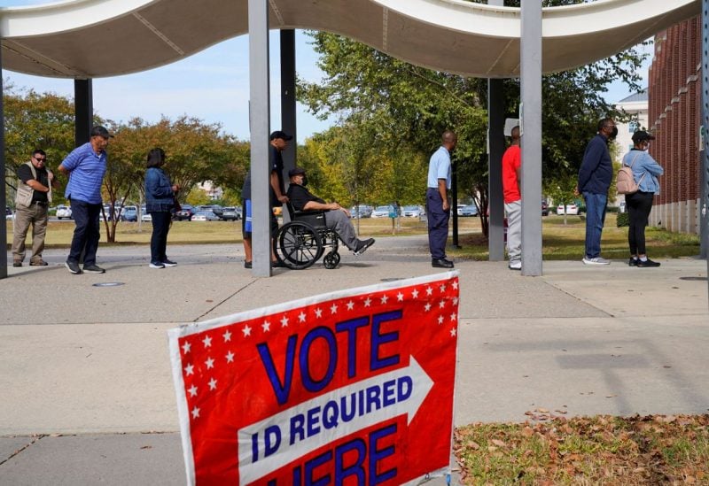 A line of early voters stretches outside the building as early voting begins for the midterm elections at the Citizens Service Center in Columbus, Georgia, U.S., October 17, 2022. REUTERS/Cheney Orr/File Photo