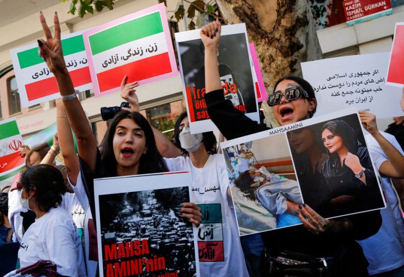 Demonstrators shout slogans during a protest following the death of Mahsa Amini in Iran, near the Iranian consulate in Istanbul, Turkey September 29, 2022. REUTERS