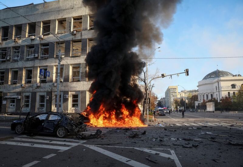 Cars burn after Russian military strike, as Russia's invasion of Ukraine continues, in central Kyiv, Ukraine October 10, 2022. REUTERS