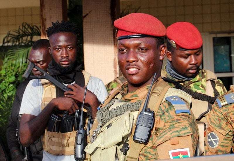 FILE PHOTO: Burkina Faso's new military leader Ibrahim Traore is escorted by soldiers in Ouagadougou, Burkina Faso October 2, 2022. REUTERS/Vincent Bado/File Photo