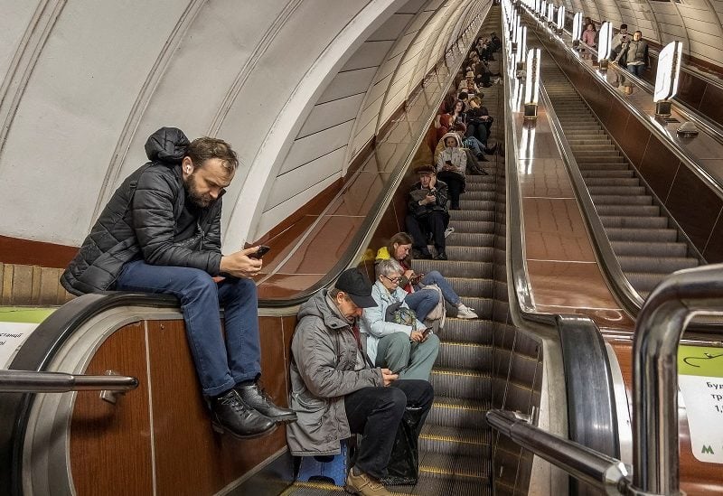 FILE PHOTO: People shelter inside a subway station during a Russian missile attack, as Russia's attack on Ukraine continues, in Kyiv, Ukraine October 25, 2022. REUTERS/Vladyslav Musiienko/File Photo