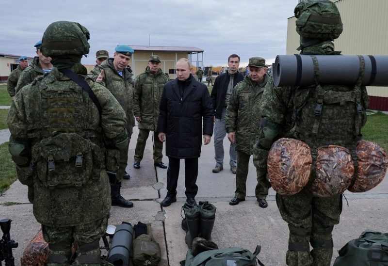 Russian President Vladimir Putin listens to Deputy Commander of the Airborne Troops Anatoly Kontsevoy at a training centre of the Western Military District for mobilised reservists, in Ryazan Region, Russia October 20, 2022. Russian Defence Ministry/Handout via REUTERS ATTENTION EDITORS - THIS IMAGE WAS PROVIDED BY A THIRD PARTY. NO RESALES. NO ARCHIVES. MANDATORY CREDIT.