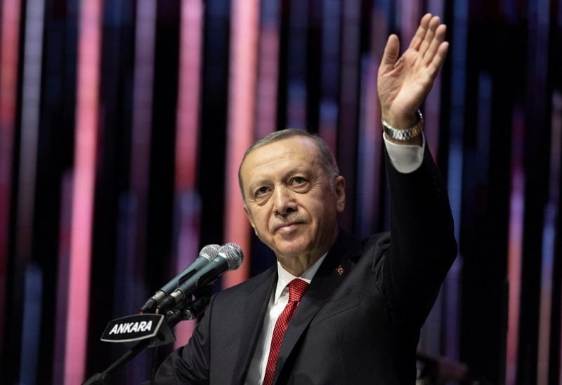 Turkish President Tayyip Erdogan greets the audience at Century of Turkey meeting in Ankara, Turkey, October 28, 2022. REUTERS/Umit Bektas