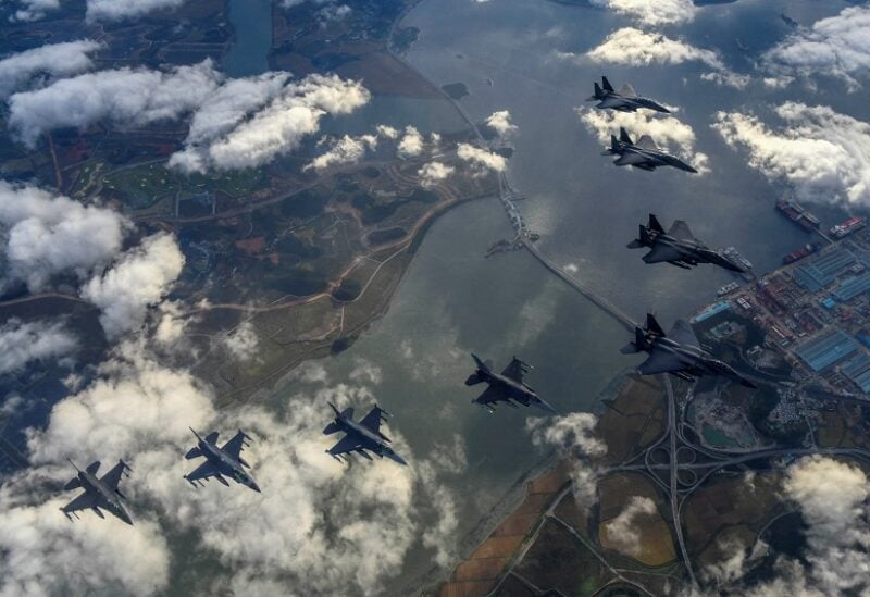 South Korean and U.S. fighter jets take part in a joint bombing drill in this handout picture provided by the Defense Ministry, South Korea, October 4, 2022. South Korean Defense Ministry/Yonhap via REUTERS ATTENTION EDITORS - THIS IMAGE HAS BEEN SUPPLIED BY A THIRD PARTY. NO RESALES. NO ARCHIVE. TPX IMAGES OF THE DAY