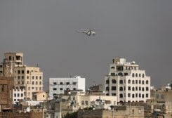 A military helicopter, operated by the Houthis, flies over Sanaa, Yemen September 21, 2022 for the first time since the Saudi-led coalition intervened in Yemen and controlled the country's airspace in 2015. REUTERS/Khaled Abdullah
