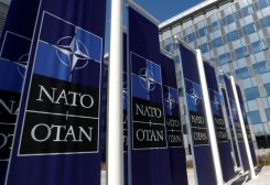 Banners displaying the NATO logo are placed at the entrance of new NATO headquarters in Brussels, Belgium April 19, 2018. REUTERS/Yves Herman/File Photo
