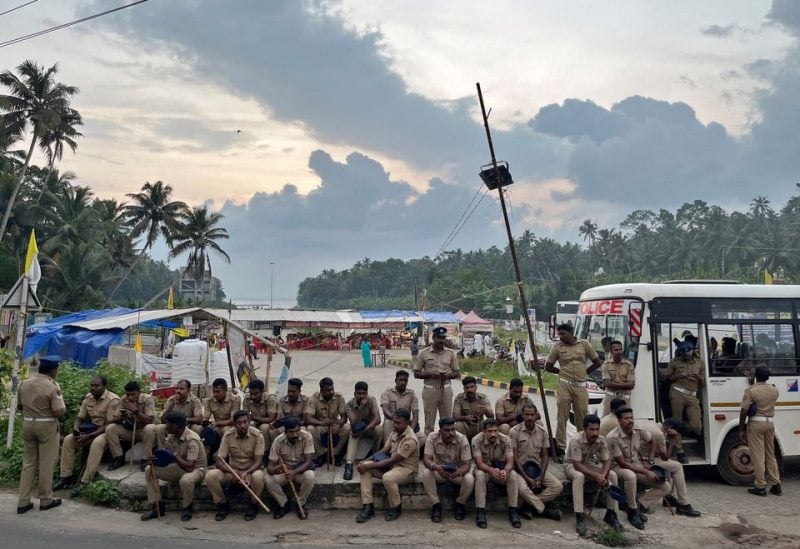 Police officers are deployed as fishermen protest near the entrance of the proposed Vizhinjam Port in the southern state of Kerala, India, November 9, 2022. REUTERS/Munsif Vengattil/