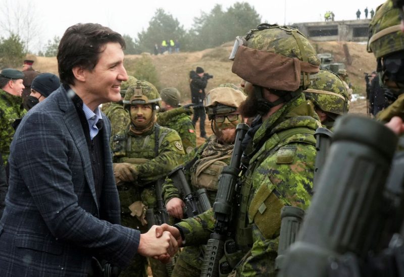 Canadian Prime Minister Justin Trudeau visits members of the Canadian troops, following the Russian invasion of Ukraine, in the Adazi military base, Latvia, March 8, 2022. REUTERS/Ints Kalnins/File Photo