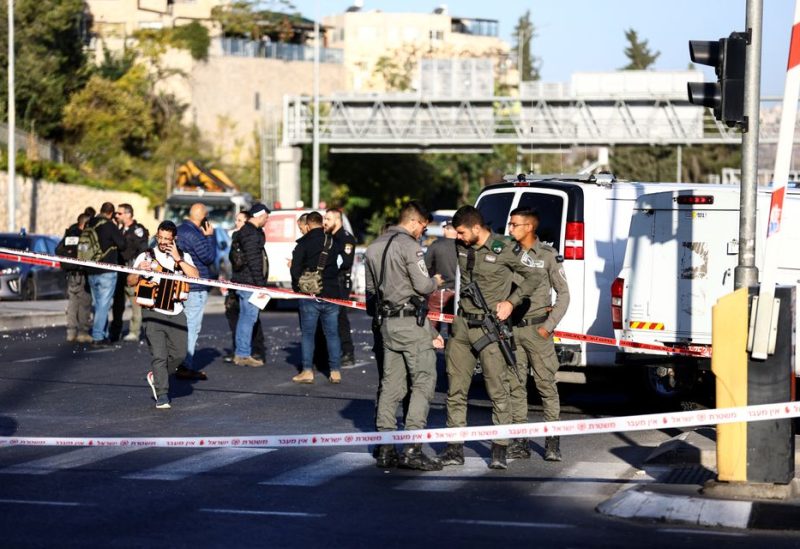 Security and rescue forces work at the scene of an explosion at a bus stop in Jerusalem November 23, 2022. REUTERS/Ronen Zvulun