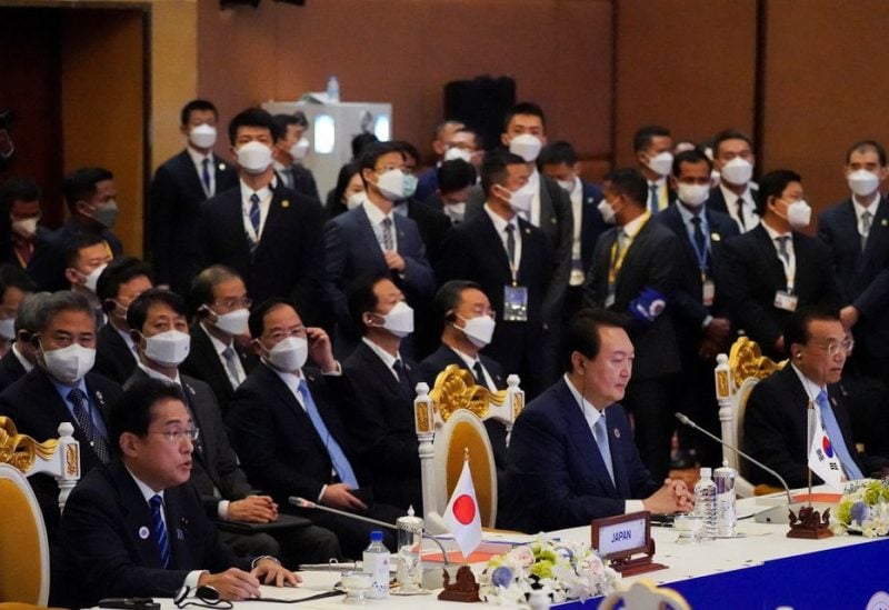 Japan's Prime Minister Fumio Kishida, South Korea's President Yoon Suk-yeol and Chinese Premier Li Keqiang attend the 25th ASEAN plus Three (APT) Summit during the ASEAN summit held in Phnom Penh, Cambodia November 12, 2022. REUTERS/Cindy Liu