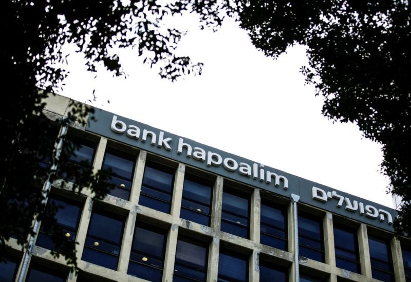The logo of Bank Hapoalim is seen at a branch in Tel Aviv, Israel November 22, 2021. REUTERS/Corinna Kern