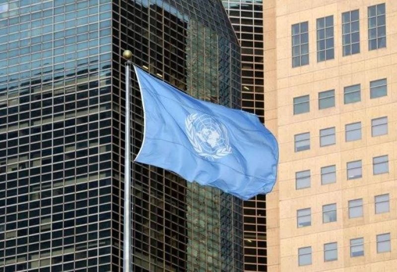The UN flag flying above its headquarters in New York, September 23, 2019. (Credit: AFP)