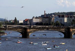 People ride pedal boats on the Vltava river following the coronavirus disease (COVID-19) outbreak, in Prague, Czech Republic, June 22, 2020. REUTERS/David W Cerny