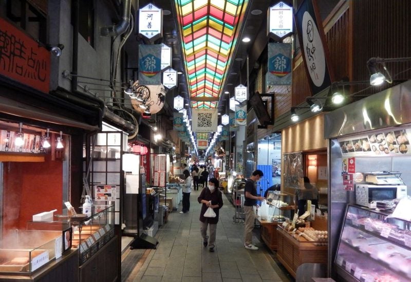 Shoppers are seen at Nishiki Market in Kyoto, western Japan June 18, 2022. REUTERS/Satoshi Sugiyama