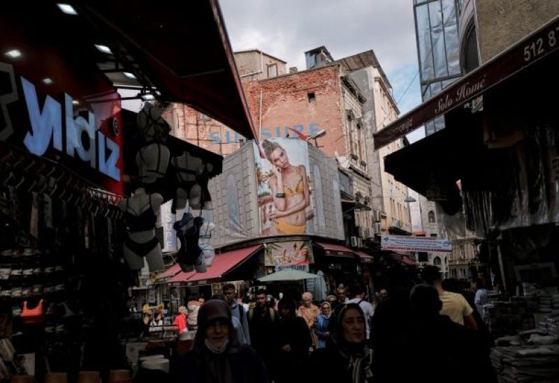 People stroll at a middle-class shopping district in Istanbul, Turkey October 12, 2022. REUTERS