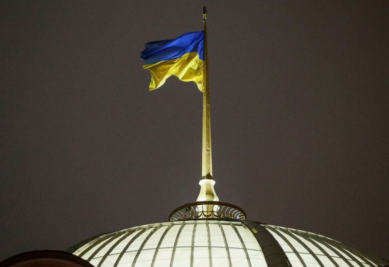 A Ukrainian national flag flies over the parliament building (Verkhovna Rada), in Kyiv, Ukraine, November 26, 2018. REUTERS