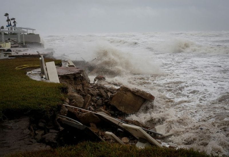 Waves crash into a beachfront park after Hurricane Nicole made landfall on Florida's east coast, in Daytona Beach Shores, Florida, U.S., November 10, 2022. REUTERS