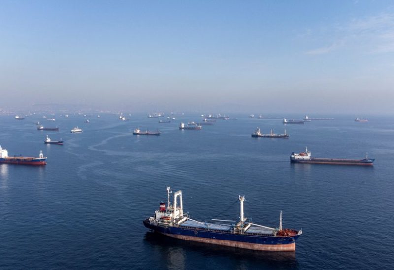 Commercial vessels including vessels which are part of Black Sea grain deal wait to pass the Bosphorus strait off the shores of Yenikapi during a misty morning in Istanbul, Turkey, October 31, 2022. REUTERS