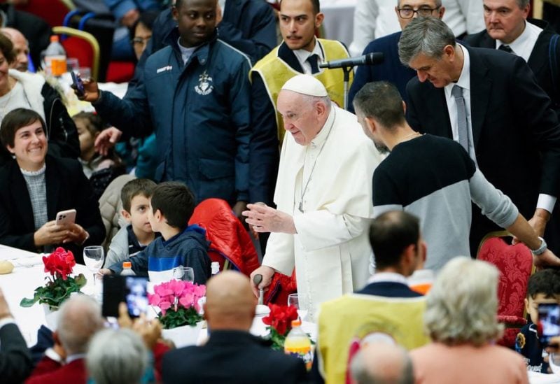 Pope Francis participates in a lunch offered by the Vatican to the poor people, on World Day of Poor at the Vatican, November 13, 2022. REUTERS