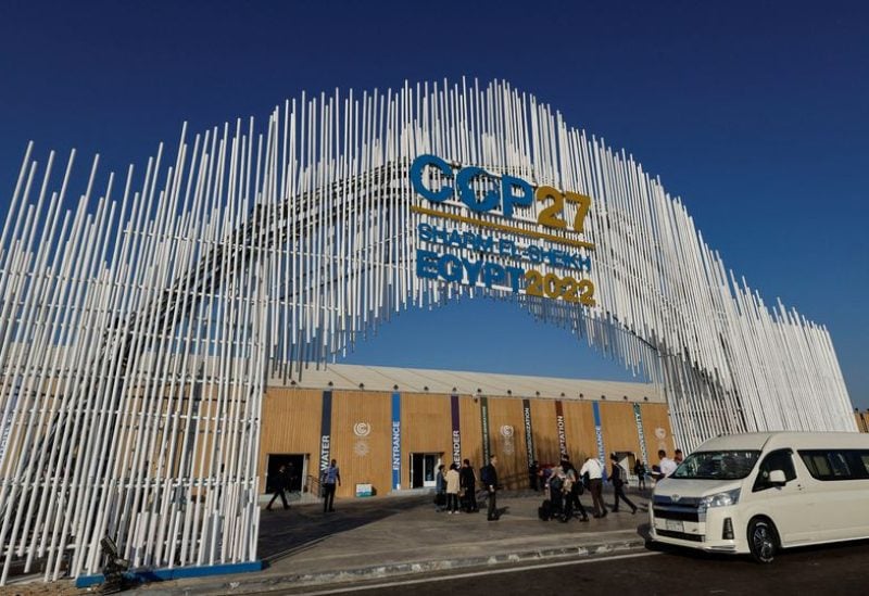 Participants walk outside of the Sharm El Sheikh International Convention Centre before the COP27 climate summit opening in Sharm el-Sheikh, Egypt November 7, 2022. REUTERS