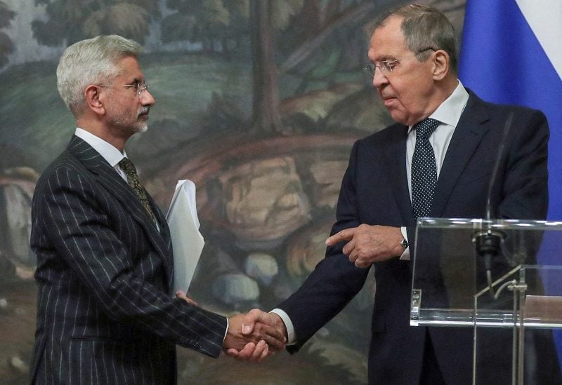 Russian Foreign Minister Sergei Lavrov and his Indian counterpart Subrahmanyam Jaishankar shake hands during a news conference following their talks in Moscow, Russia, November 8, 2022. Maxim Shipenkov/Pool via REUTERS