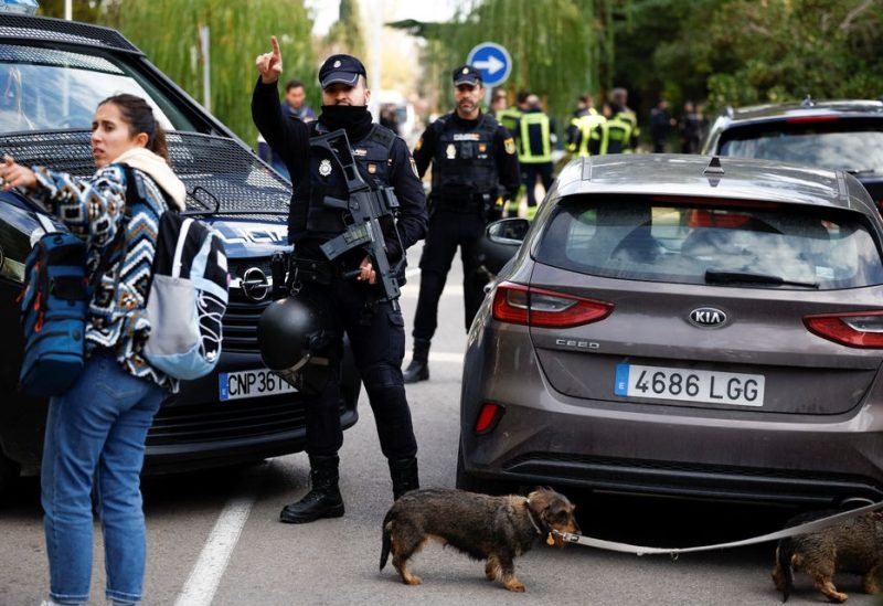 Police stands outside of Ukrainian embassy after, Spanish police said, blast at embassy building injured one employee while handling a letter, in Madrid, Spain November 30, 2022. REUTERS