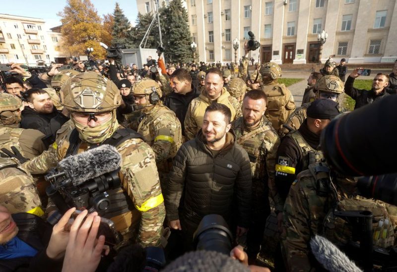 Ukraine's President Volodymyr Zelenskiy speaks to people after Russia's retreat from Kherson, in central Kherson, Ukraine November 14, 2022. REUTERS