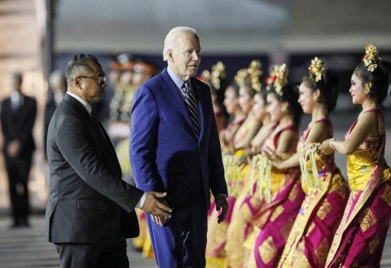 U.S. President Joe Biden walks during his arrival for the G20 Summit at Ngurah Rai International airport in Bali, Indonesia November 13, 2022. Made Nagi/Pool via REUTERS