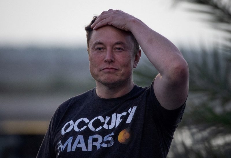 FILE PHOTO: SpaceX Chief Engineer Elon Musk takes part in a joint news conference with T-Mobile CEO Mike Sievert (not pictured) at the SpaceX Starbase, in Brownsville, Texas, U.S., August 25, 2022. REUTERS/Adrees Latif/File Photo