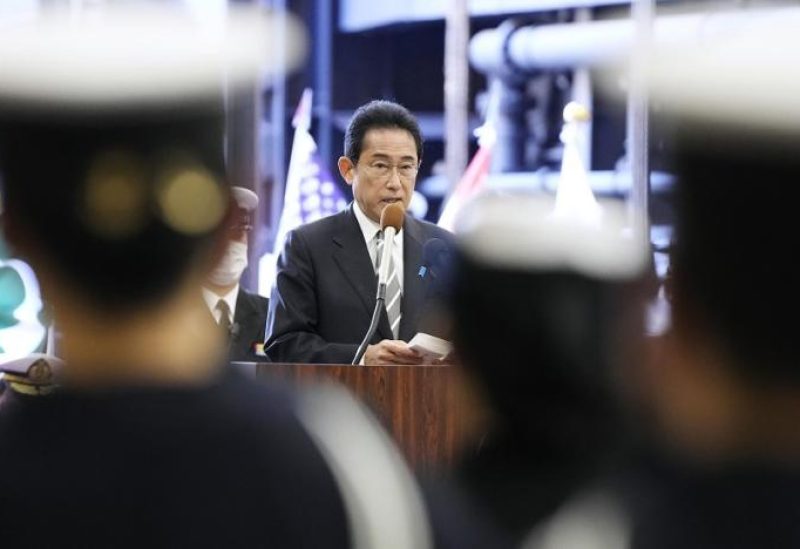 Japanese Prime Minister Fumio Kishida delivers a speech on the Maritime Self Defense Force's helicopter carrier JS Izumo during an international fleet review in Sagami Bay, southwest of Tokyo, Sunday, Nov. 6, 2022. (AP)