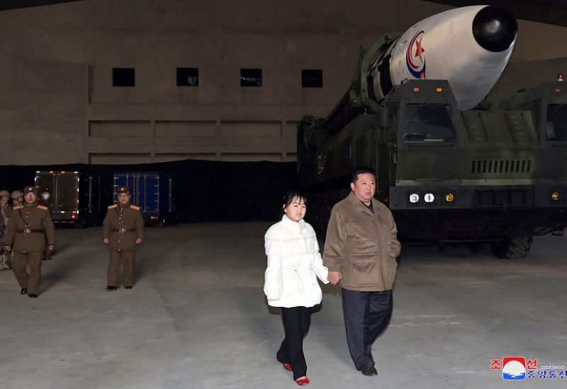 North Korean leader Kim Jong Un, along with his daughter, inspects an intercontinental ballistic missile (ICBM) in this undated photo released on November 19, 2022 by North Korea's Korean Central News Agency (KCNA). KCNA via REUTERS ATTENTION EDITORS - THIS IMAGE WAS PROVIDED BY A THIRD PARTY. NO THIRD PARTY SALES. SOUTH KOREA OUT. NO COMMERCIAL OR EDITORIAL SALES IN SOUTH KOREA. REUTERS IS UNABLE TO INDEPENDENTLY VERIFY THIS IMAGE.