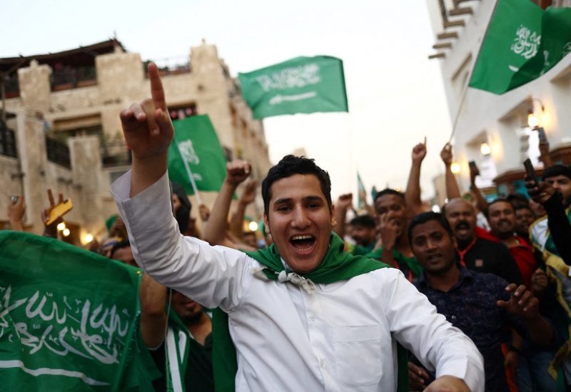 Soccer Football - FIFA World Cup Qatar 2022 - Doha, Qatar - November 22, 2022 Saudi Arabia fans celebrate in Souq Waqif after the match between Saudia Arabia and Argentina REUTERS/Pedro Nunes TPX IMAGES OF THE DAY