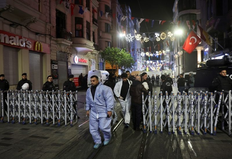 Members of the security forces stand near the scene after an explosion on busy pedestrian Istiklal street in Istanbul, Turkey, November 13, 2022. REUTERS/Umit Bektas