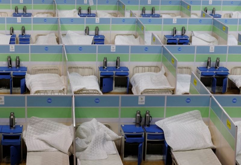 Beds are seen in a fever clinic that was set up in a sports area as coronavirus disease (COVID-19) outbreaks continue in Beijing, December 20, 2022. REUTERS/Thomas Peter