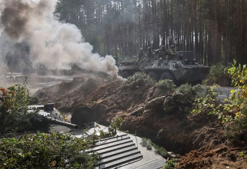 Ukrainian servicemen attend a joint drill of the armed forces, national guard and border guard at the border with Belarus, amid Russia's attack on Ukraine, in Chernihiv region, Ukraine September 30, 2022. REUTERS/Gleb Garanich