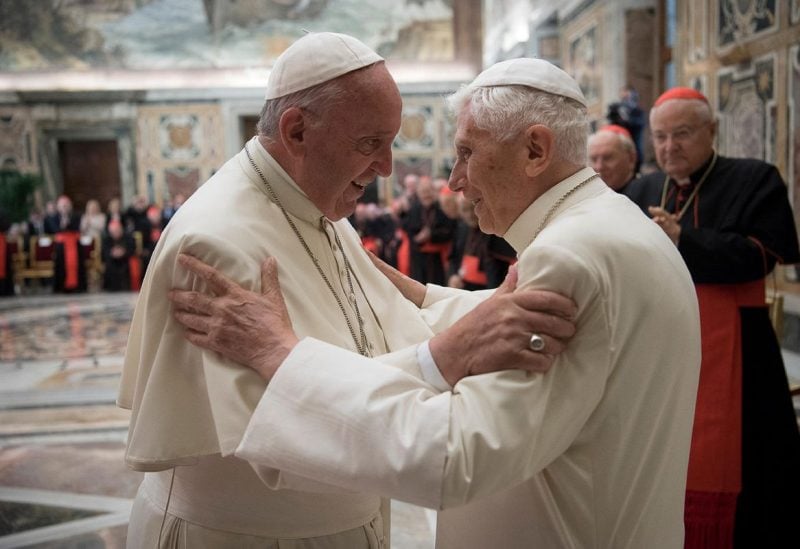 Former pope Benedict (R) is greeted by Pope Francis during a ceremony to mark his 65th anniversary of ordination to the priesthood at the Vatican June 28, 2016. Osservatore Romano/Handout via Reuters