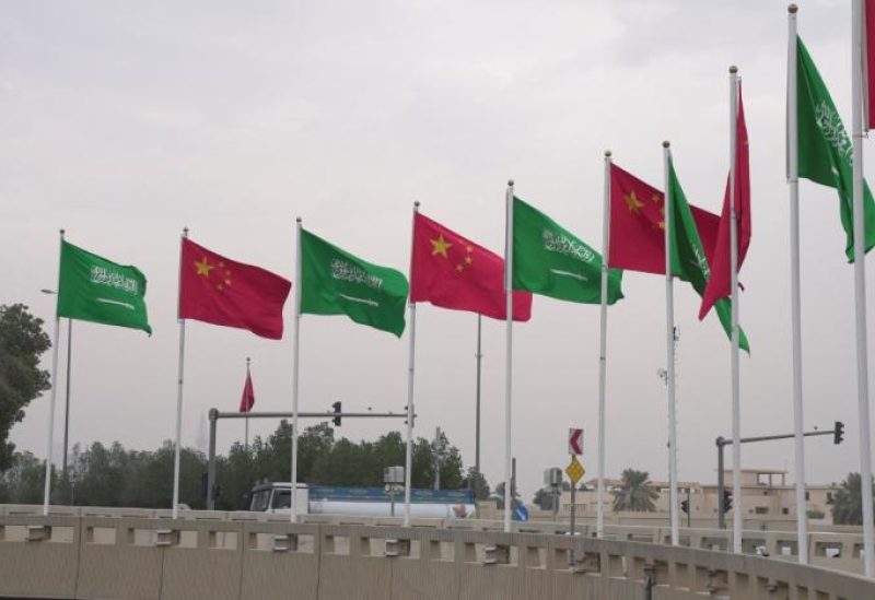 Saudi and Chinese flags ahead of the China-Arab summit in Riyadh