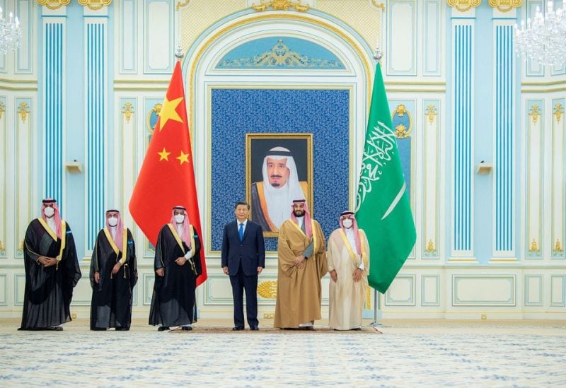 Saudi Crown Prince Mohammed Bin Salman stands with Chinese President Xi Jinping in Riyadh, Saudi Arabia December 8, 2022. Saudi Press Agency/Handout via REUTERS