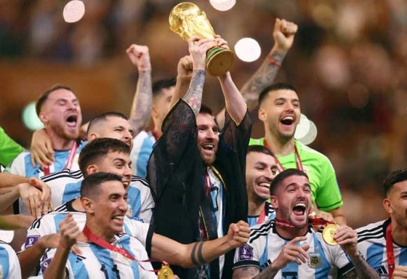 Argentina's players celebrate their victory at the end of the World Cup final soccer match between Argentina and France at the Lusail Stadium in Lusail, Qatar, Sunday, Dec. 18, 2022. (AP)