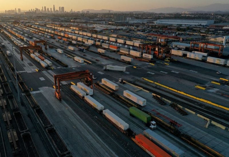 An aerial view of gantry cranes, shipping containers, and freight railway trains ahead of a possible strike if there is no deal with the rail worker unions, at the Union Pacific Los Angeles (UPLA) Intermodal Facility rail yard in Commerce, California, U.S., September 15, 2022. REUTERS/Bing Guan