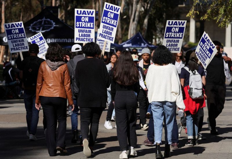 Academic workers at UC San Diego walk out as thousands of employees at the University of California campuses have gone on strike in an effort to secure improved pay and working conditions in San Diego, California, U.S., November 14, 2022. REUTERS/Mike Blake/File Photo