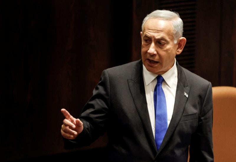 Israeli Prime Minister-designate Benjamin Netanyahu attends a special session of the Knesset, Israel's parliament, to approve and swear in a new right-wing government, in Jerusalem December 29, 2022. REUTERS/Amir Cohen/Pool